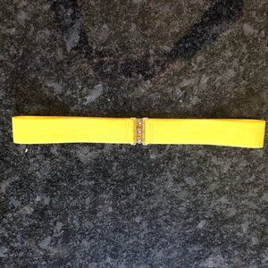 Unbranded elastic yellow belt with silver clasp, 38 inches